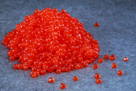 Placer of red caviar on a tableの写真素材