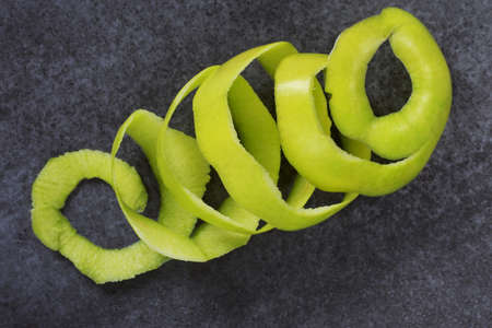 peel of apple on a grey backgroundの写真素材