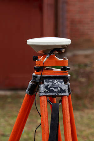 the gps receiver antenna is mounted on a tripodの写真素材