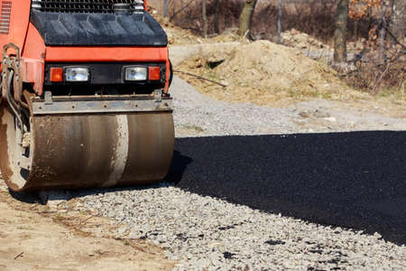 roller working on the new road construction site