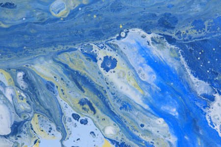 Abstract blue paints background close up