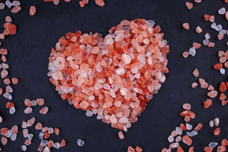 The himalayan rose salt on heart shapeの写真素材