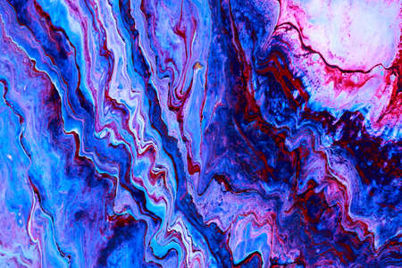 Abstract background of acrylic paint in blue and purple tones