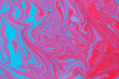 Abstract background of acrylic paint in blue and red tones