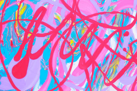 Abstract background of acrylic paint in blue red and yellow tones