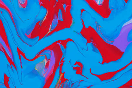 Abstract background of acrylic paint in blue and red tones