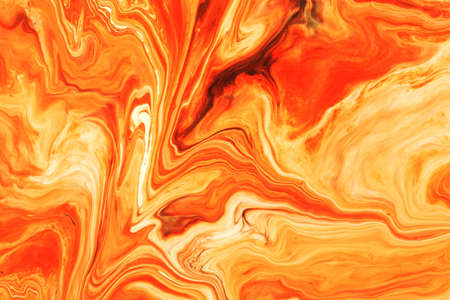 Abstract background of acrylic paint in orange tonesの写真素材