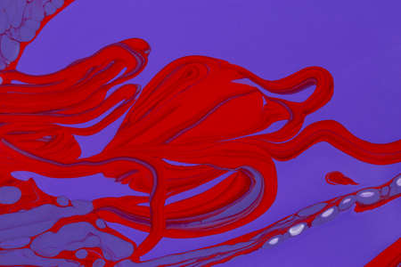 Abstract background of acrylic paint in violet and red tones