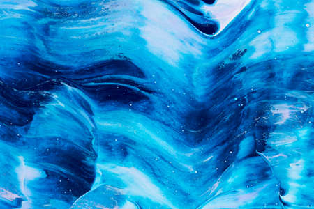 Abstract background of acrylic paint in blue and violet tone