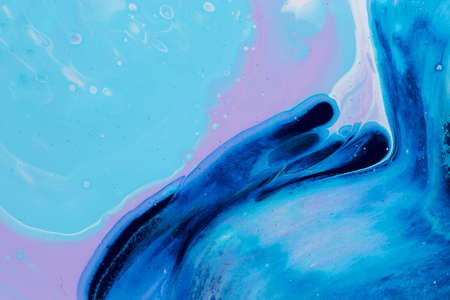 Abstract background of acrylic paint in blue and violet tone