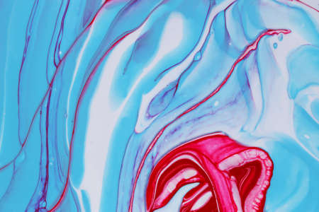 Abstract background of acrylic paint in blue and red tones