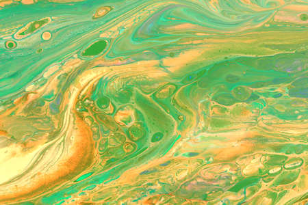 Abstract background of acrylic paint in orange tonesの写真素材