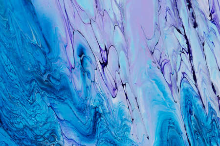 Abstract background of acrylic paint in blue and violet tone