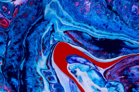 Abstract background of acrylic paint in blue and red tonesの写真素材