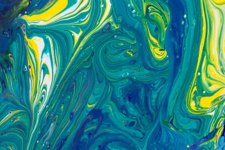 Abstract background of acrylic paint in green and yellow toneの写真素材