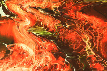 Abstract background of acrylic paint in orange tones