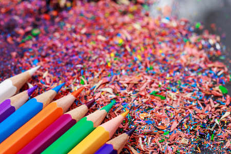 The pencils and colored graphite crumbs a close-upの写真素材