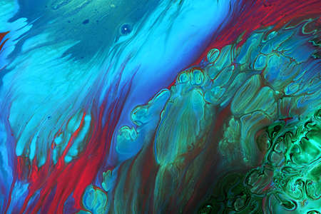 Abstract background of acrylic paints in aquamarine and blue color tones