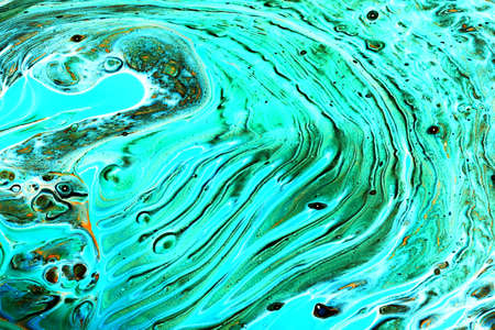 Abstract background of acrylic paints in aquamarine color tones