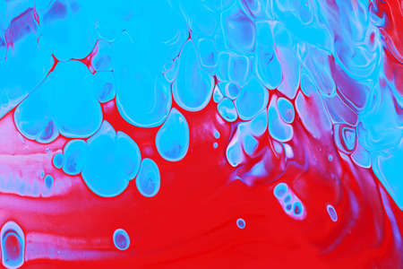 Abstract background of acrylic paint in blue and red tone