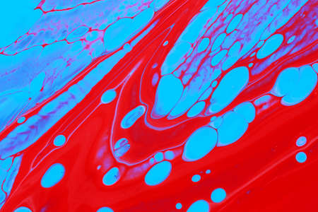 Abstract background of acrylic paint in blue and red tone