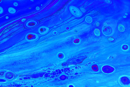 Abstract background of acrylic paints in aquamarine and blue color tonesの写真素材