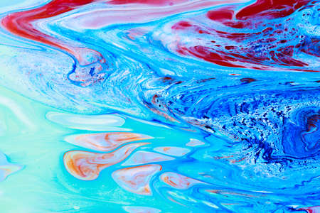 Abstract background of acrylic paints in color tonesの写真素材