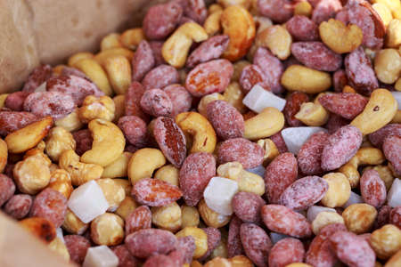 Glazed almonds and cashews at a street food festival