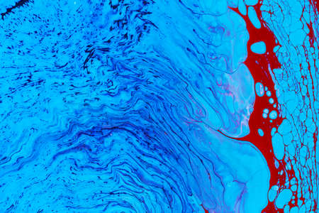 Abstract background of acrylic paints in color tonesの写真素材