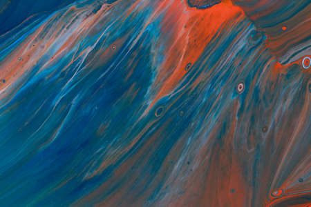 Abstract background of acrylic paints in color tones