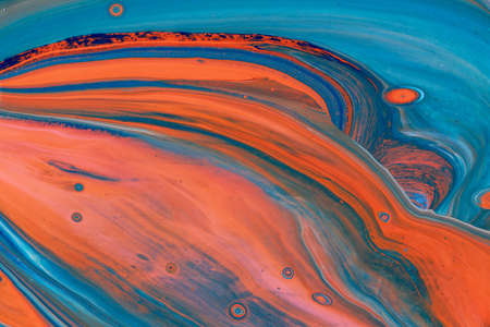 Abstract background of acrylic paints in color tones
