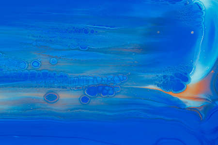 Abstract background of acrylic paints in color tones
