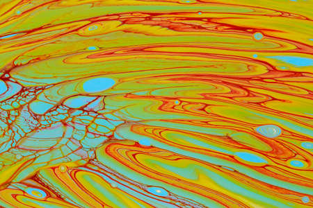 Abstract background of acrylic paints in color tones