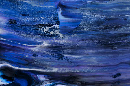 Abstract background of acrylic paints in color tones