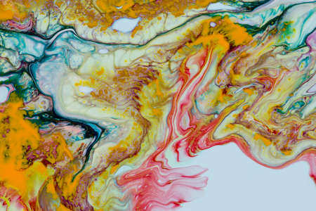 Abstract background of acrylic paint in yellow tones