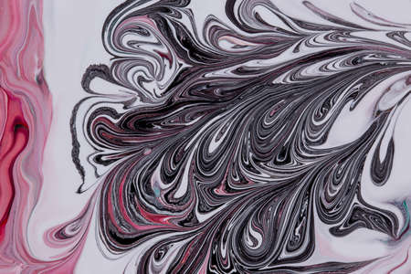 Abstract background of acrylic paint in pink and black tonesの写真素材