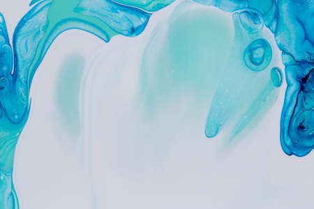 Abstract background of acrylic paint in white and blue tonesの写真素材