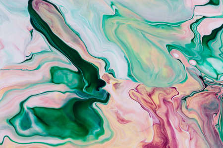 Abstract background of acrylic paint in pink and green tones