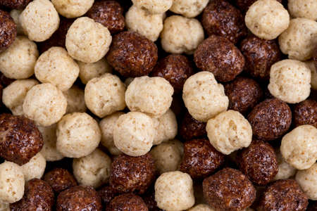 Background of round corn balls a milk and chocolate flavor