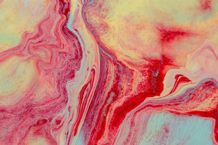 Abstract background of acrylic paint in red and yellow tonesの写真素材