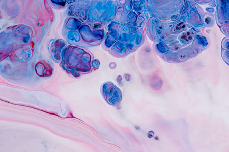 Abstract background of acrylic paint in pink and blue tonesの写真素材