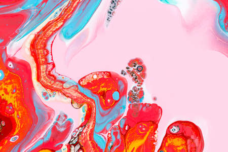 Abstract background of acrylic paint in pink and red tones