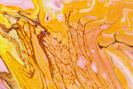 Abstract background of acrylic paint in yellow and white tones