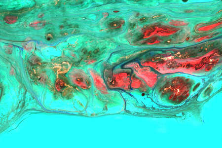 Abstract background of acrylic paint in aquamarine and orange tones