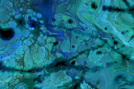 Abstract background of acrylic paint in blue and aquamarine tones
