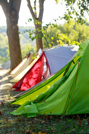 Camping picnic tent campground in outdoor hiking forest.の写真素材