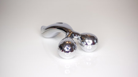 Metal massager for face and skinの写真素材