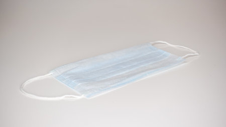 Blue medical mask from the virusの写真素材