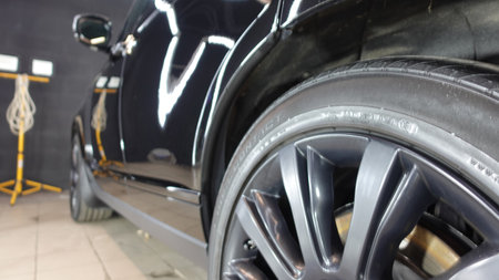 Wheels and tires on a clean carの写真素材