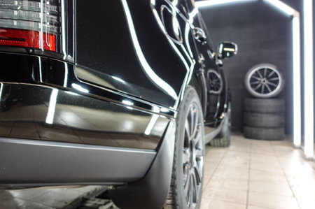 Clean shiny car at the car wash in detailingの写真素材